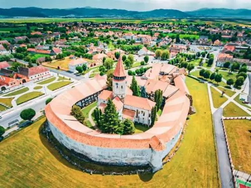 Fortified church Haman in Romania, in this article you will find out all about Romania travel costs