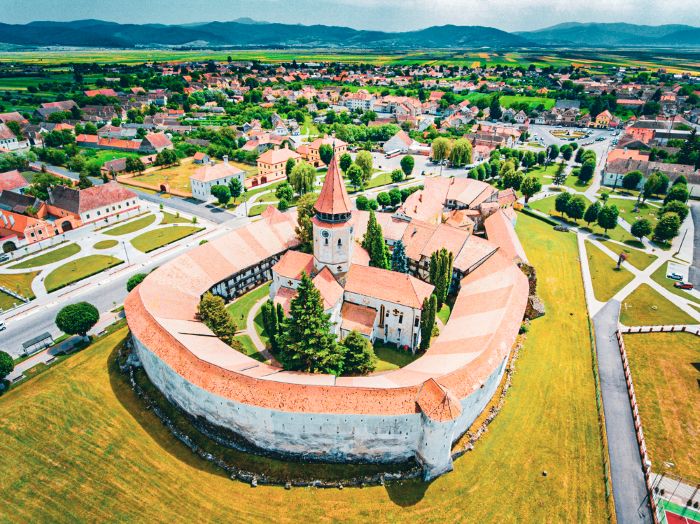 Fortified church Haman in Romania, in this article you will find out all about Romania travel costs
